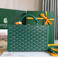 GRAND HÔTEL TRUNK BAG 24 IN GREEN GOYARDINE CANVAS AND CALFSKIN